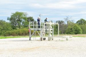 West Virginia University researchers examine natural gas well equipment for potential methane emissions.