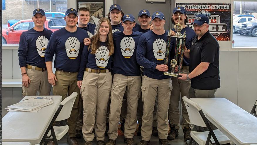 Front row: Director of mining and industrial extension Josh Brady, mining and industrial extension agent and mine rescue trainer John Helmick, students Grace Hansen, Dawson Apple, Josh Riffle and Mike Delauder from Leer Mining. Back row: Students Ricky Fe