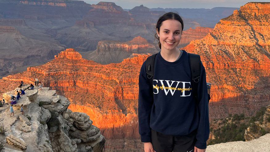 Callyn Zeigler in a SWE sweatshirt at the grand canyon. 
