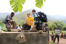 WVUEWB members work with locals to test the water supply in Kabughabugha. 