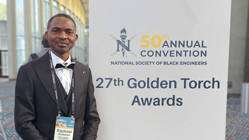 Statler graduate researcher Raphael Oladokun accepted this year's Graduate Student of the Year award at the 50th Annual Convention for the National Society of Black Engineers' 27th Golden Torch Awards ceremony on March 23 in Atlanta.