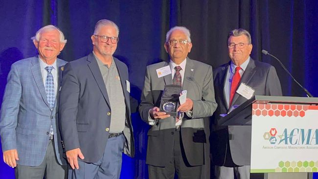 Hota GangaRao was presented with the Academic Pioneer Award from members of the American Composites Manufacturing Association committee.