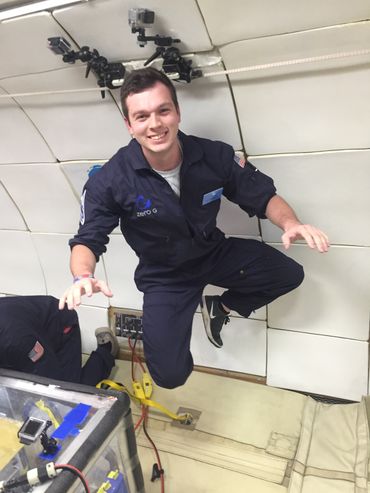 A photo of Robert Wilson, floating in microgravity.
