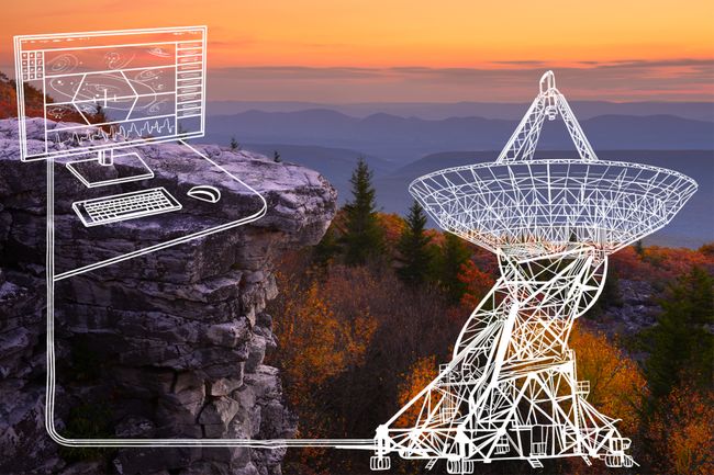 Illustration of computer linking to satelite over a photograph of a scenic mountain view