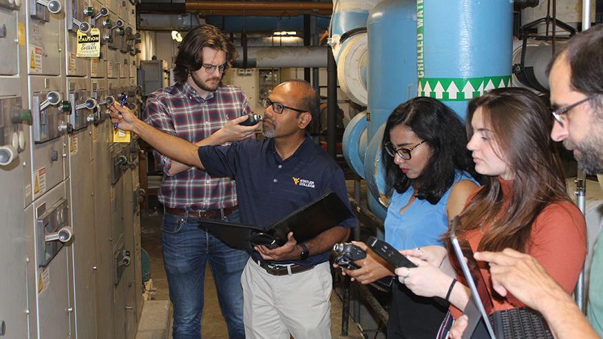 Ashish Nimbarte collects data with his team from a facility to identify opportunities for process improvement.