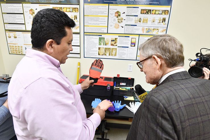 Sosa shows his research to President Gee