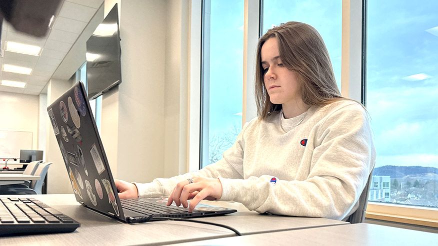 Student working on a computer.