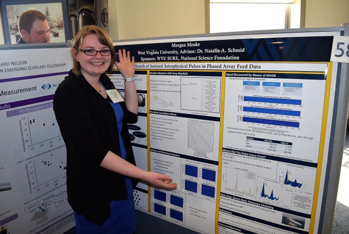 WVU engineering student Morgan Menke poses with her poster presentation at the Posters on the Hill event in Washington, D.C. 