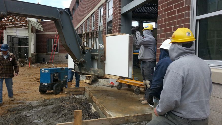 Engineers working at the elementary construction site