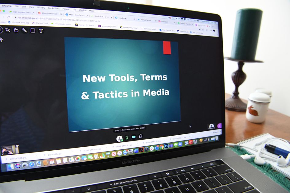 A computer screen with a power point slide that reads, "New Tools, Terms and Tactics in Media"
