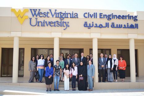 a photo of supporters and students standing in front of the WVU-RUW Global Portal 