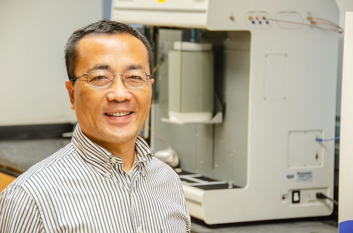  A portrait of John Hu in his research lab