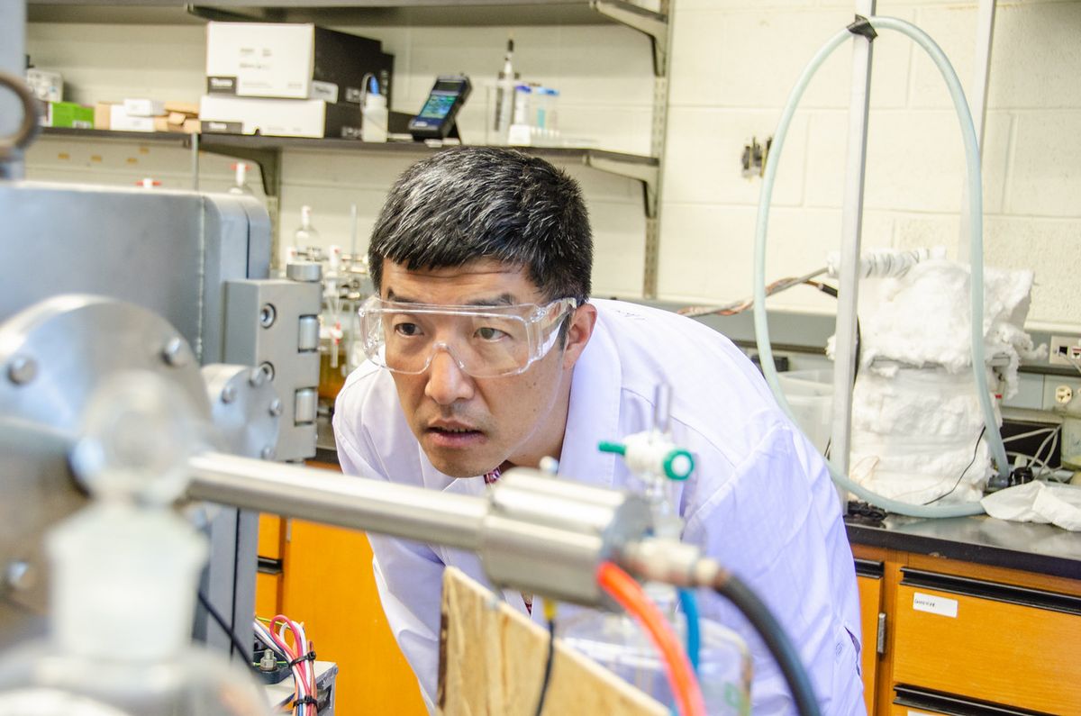 Xingbo Liu, Statler chair of engineering, conducts research at his WVU lab. The U.S. Department of Energy has awarded $2 million to support Liu’s development of high-entropy coatings capable of protecting the blades of gas turbines in power plants from the intense heat and corrosion of hydrogen combustion. Hydrogen combustion produces no greenhouse gases and technology like Liu’s may advance the emergence of a new energy economy in which green hydrogen is a predominant fuel source. (WVU Photo/Paige Nesbit)