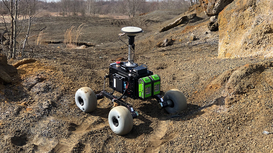 Pathfinder, a lightweight, small-scale test rover, roams an ash pile in Point Marion, Pennsylvania, for research conducted by Cagri Kilic, a WVU postdoctoral fellow. (Photo courtesy of Jonas Bredu)