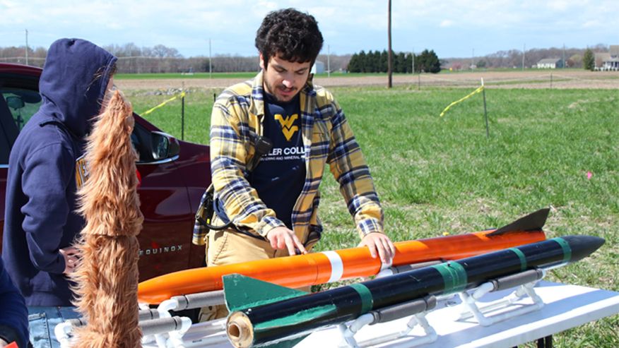 Mateo Cerasoli working on a rocket for the WVU rocketry club. 