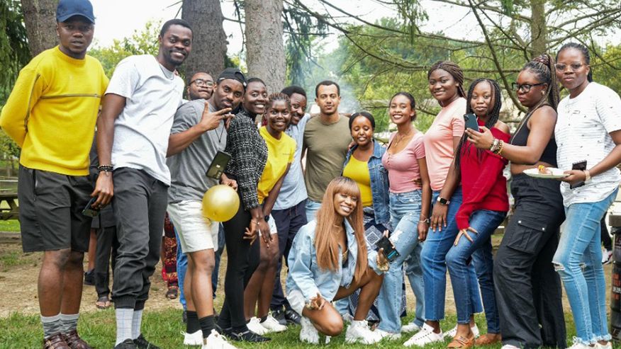 Sonia-Frida Ndifon with students from the ASA at their annual picnic. 